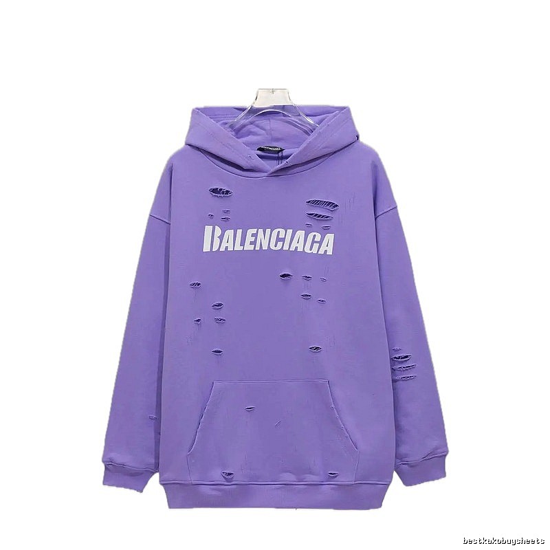 Balenciaga's ripped purple sweatshirt