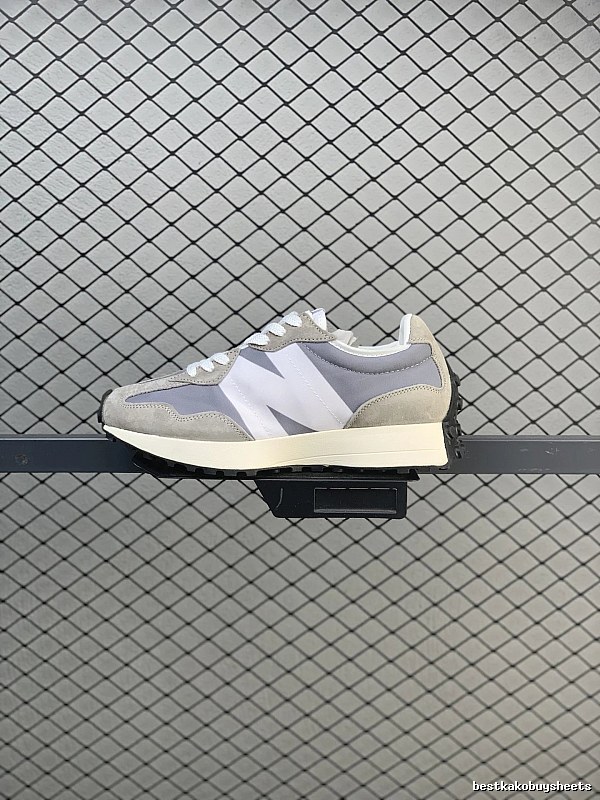 New Balance Pale Gray Retro Runners Highlighting Dynamic Sole Shape